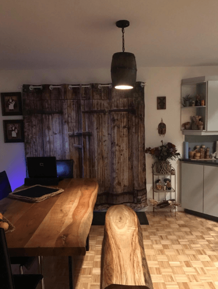 Wood Wine Barrel Pendant Lamp Hanging Unique Kitchen Bar Light Fixtures illuminating a cozy dining area.