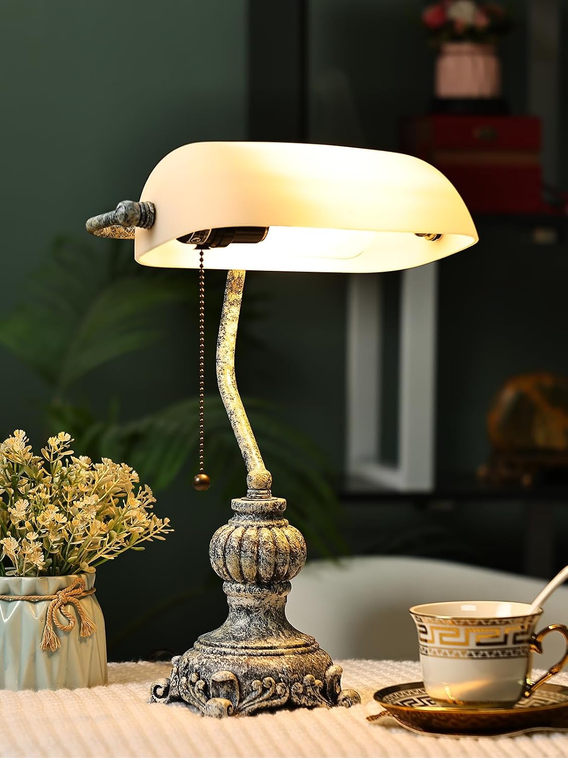 Newrays retro glass bankers desk lamp with matted glass shade and decorative base.
