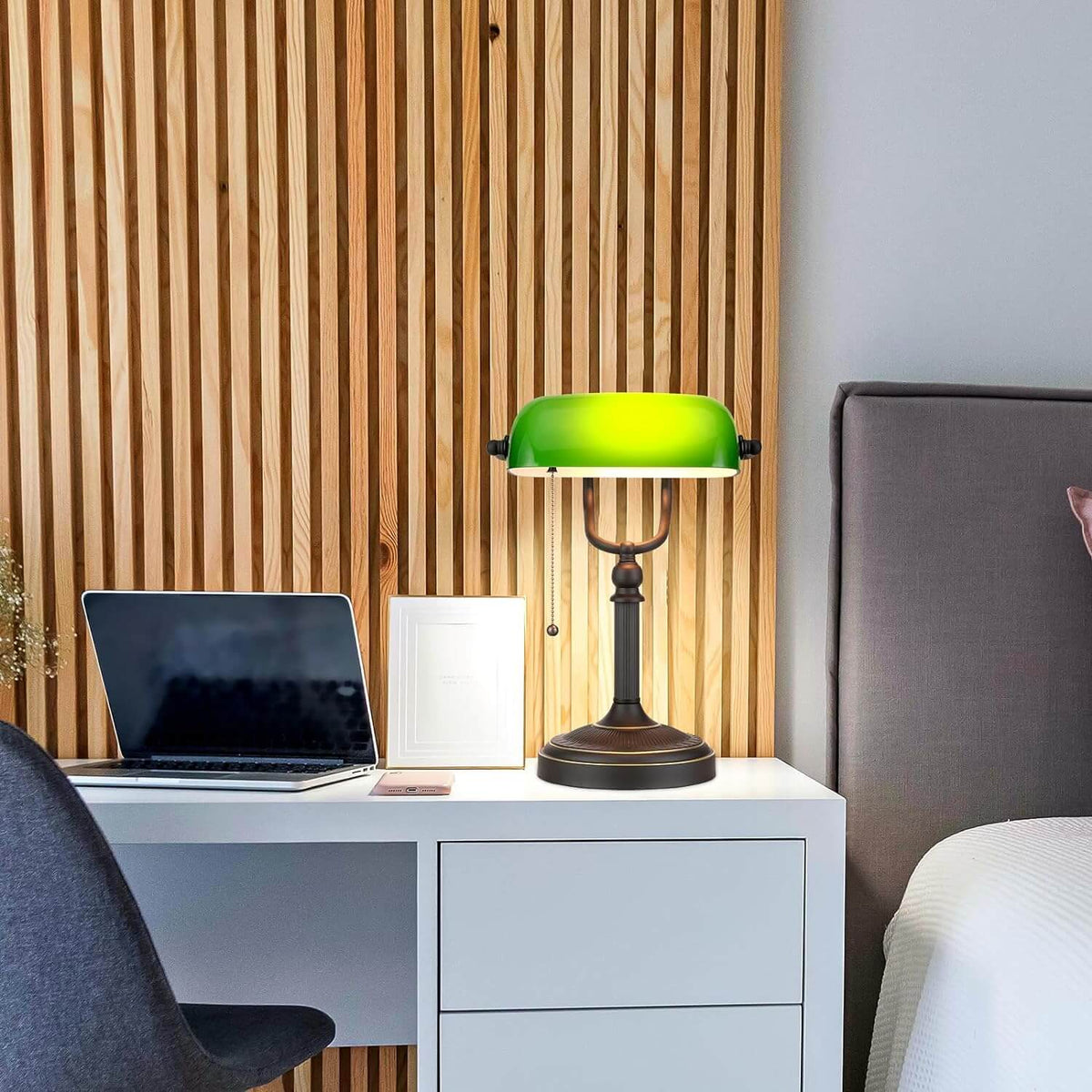 Antique Green Glass Desk Lamp with Pull Chain Switch,Banker Lamp illuminating a modern desk setup.
