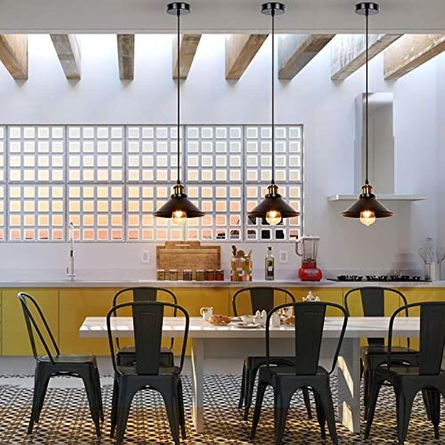 Newrays 3 Pack Industrial Black Pendant Light illuminating a modern kitchen with minimalist decor.
