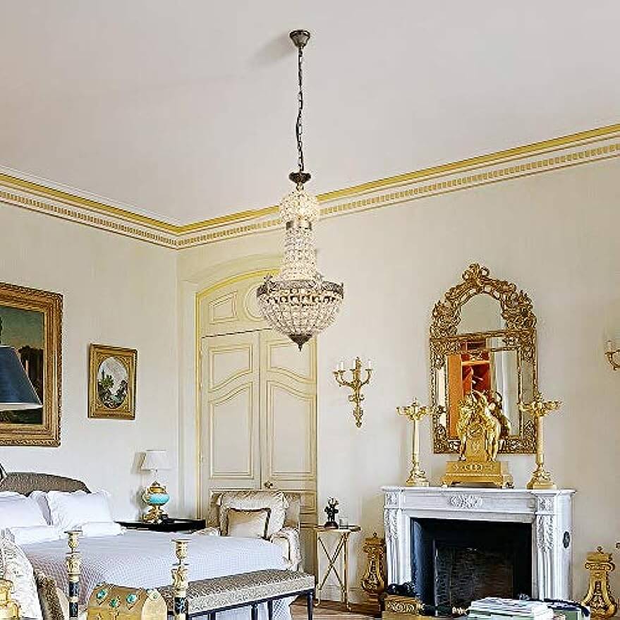 Vintage Royal Empire Crystal Chandelier hanging in an elegantly decorated room with luxury furnishings.
