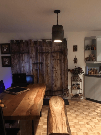 Wood Wine Barrel Pendant Lamp Unique Kitchen Bar Light H30 illuminating a rustic dining area with wooden decor.