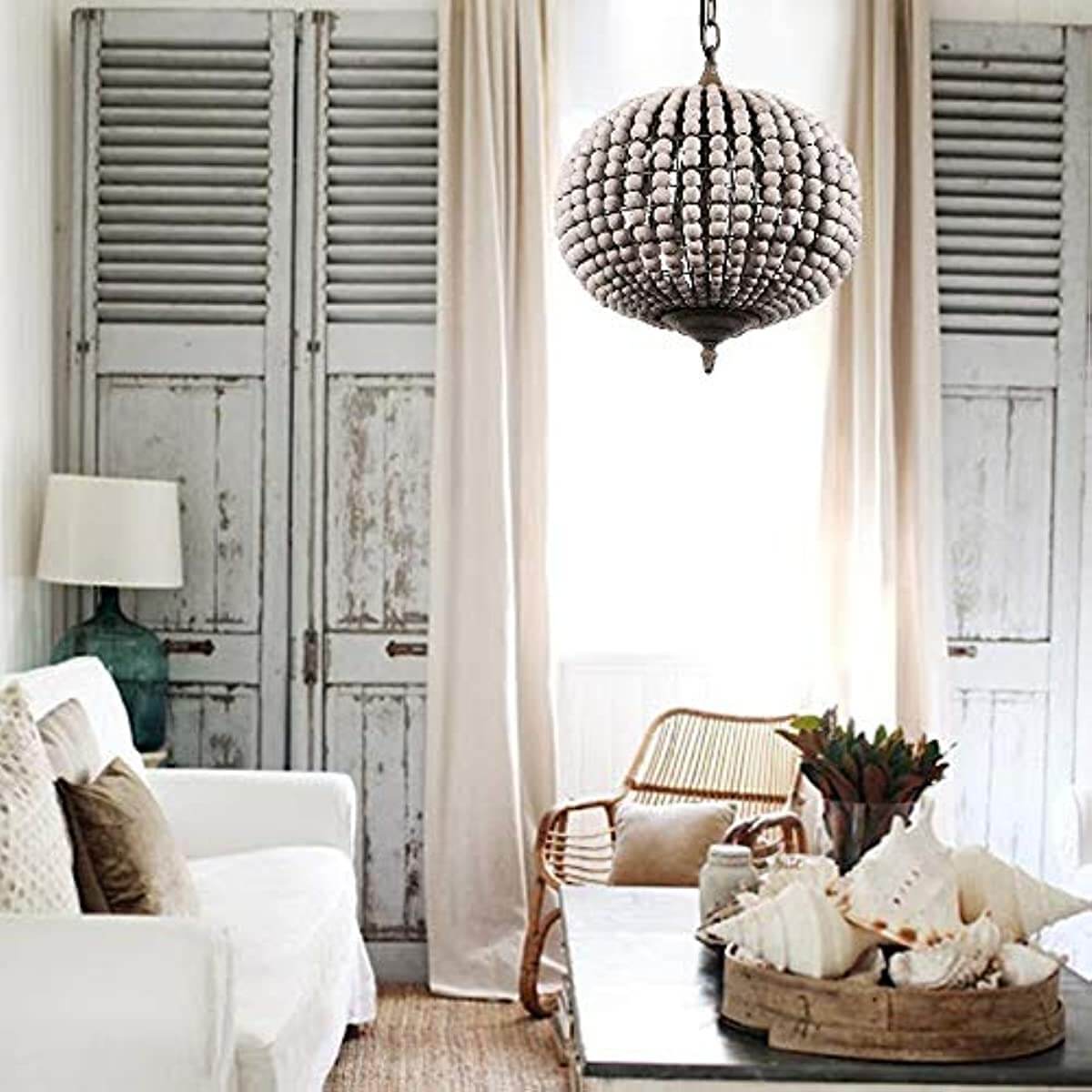 Globe Wood Bead Chandelier Pendant Gray White Finishing in a stylish living room setting.