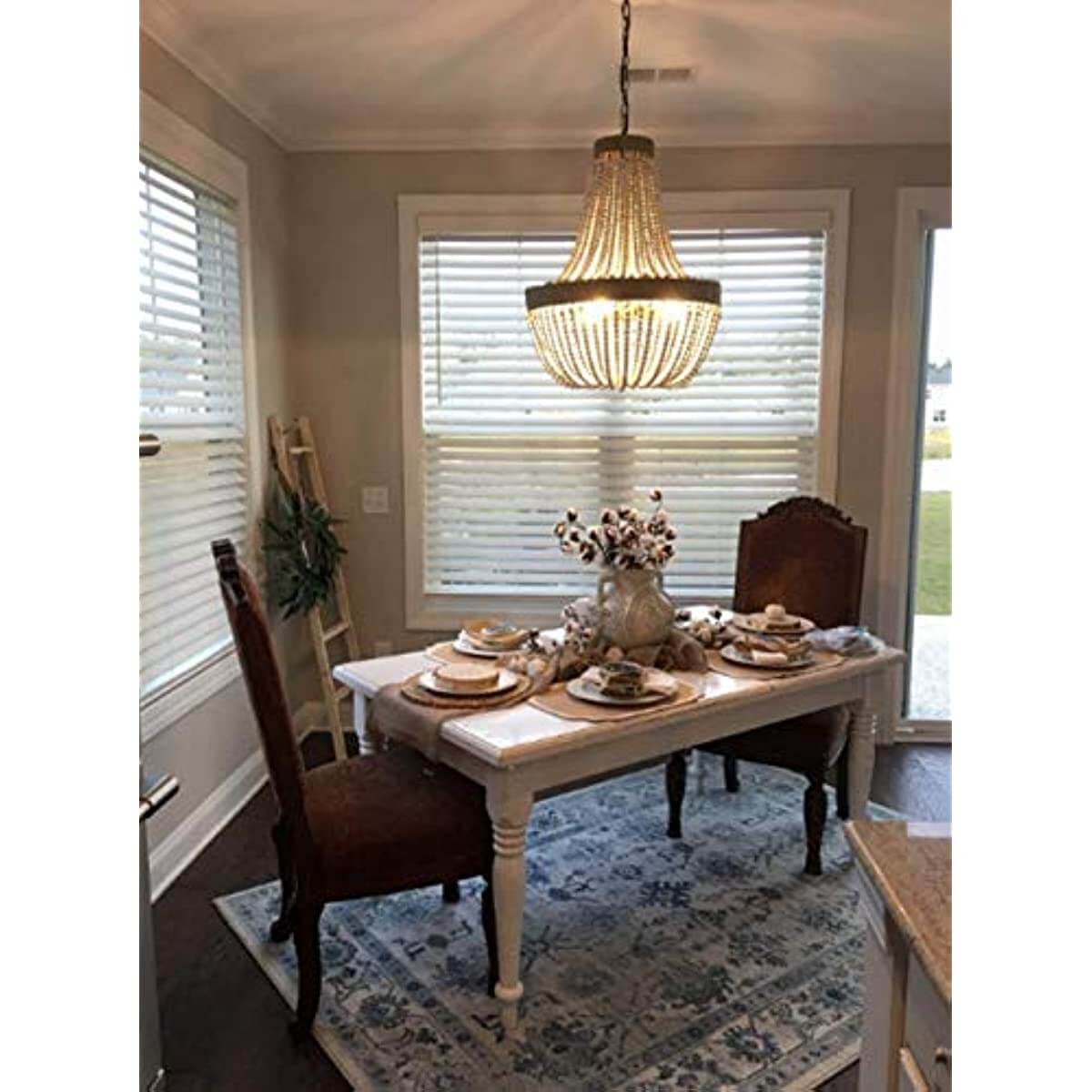 Newrays Wood Beaded Chandelier Pendant Three Lights hanging above a dining table with elegant table setting and natural light.