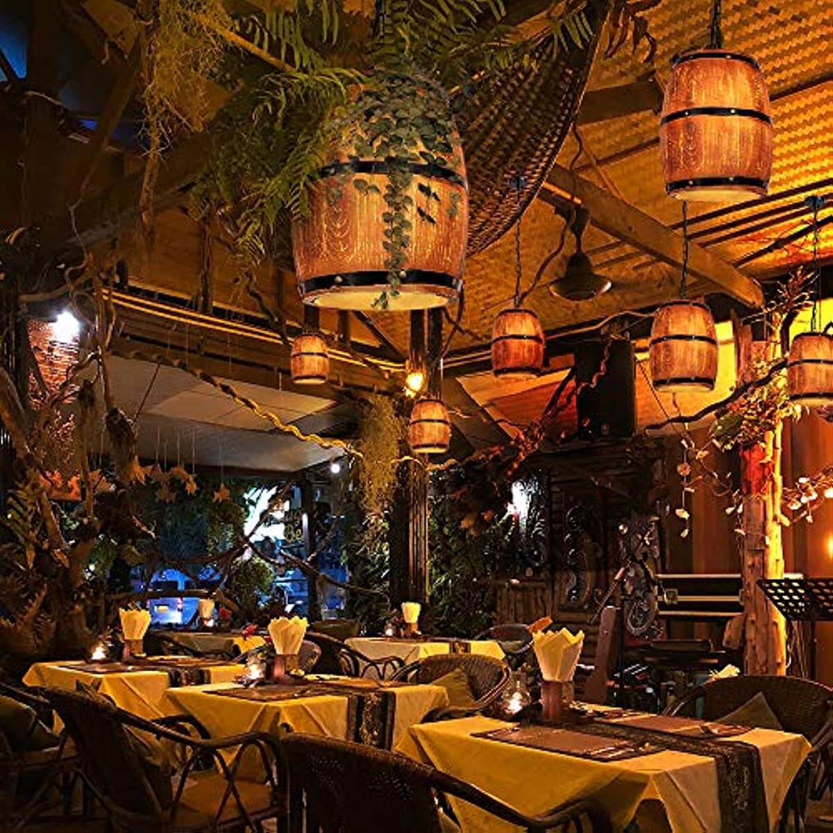 Newrays Antique Artificial Resin Wine Barrel Pendant Lamp in a cozy restaurant setting with warm lighting.