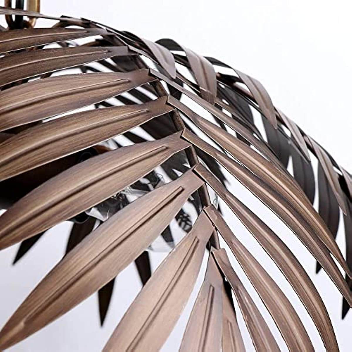 Tropical coconut ceiling light featuring bronze finish leaves, perfect for adding vintage charm to any space.