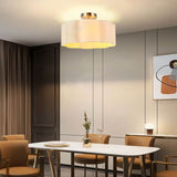3-Lights White Fabric Shade Semi Flush Mount Ceiling Light Fixture illuminating a modern dining space.