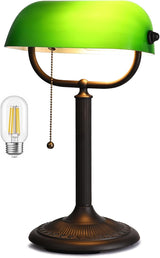Antique green glass bankers desk lamp with a bronze base and a stylish green shade for a classic look.