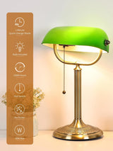 Classic green glass bankers desk lamp with brass base and pull switch for easy operation.