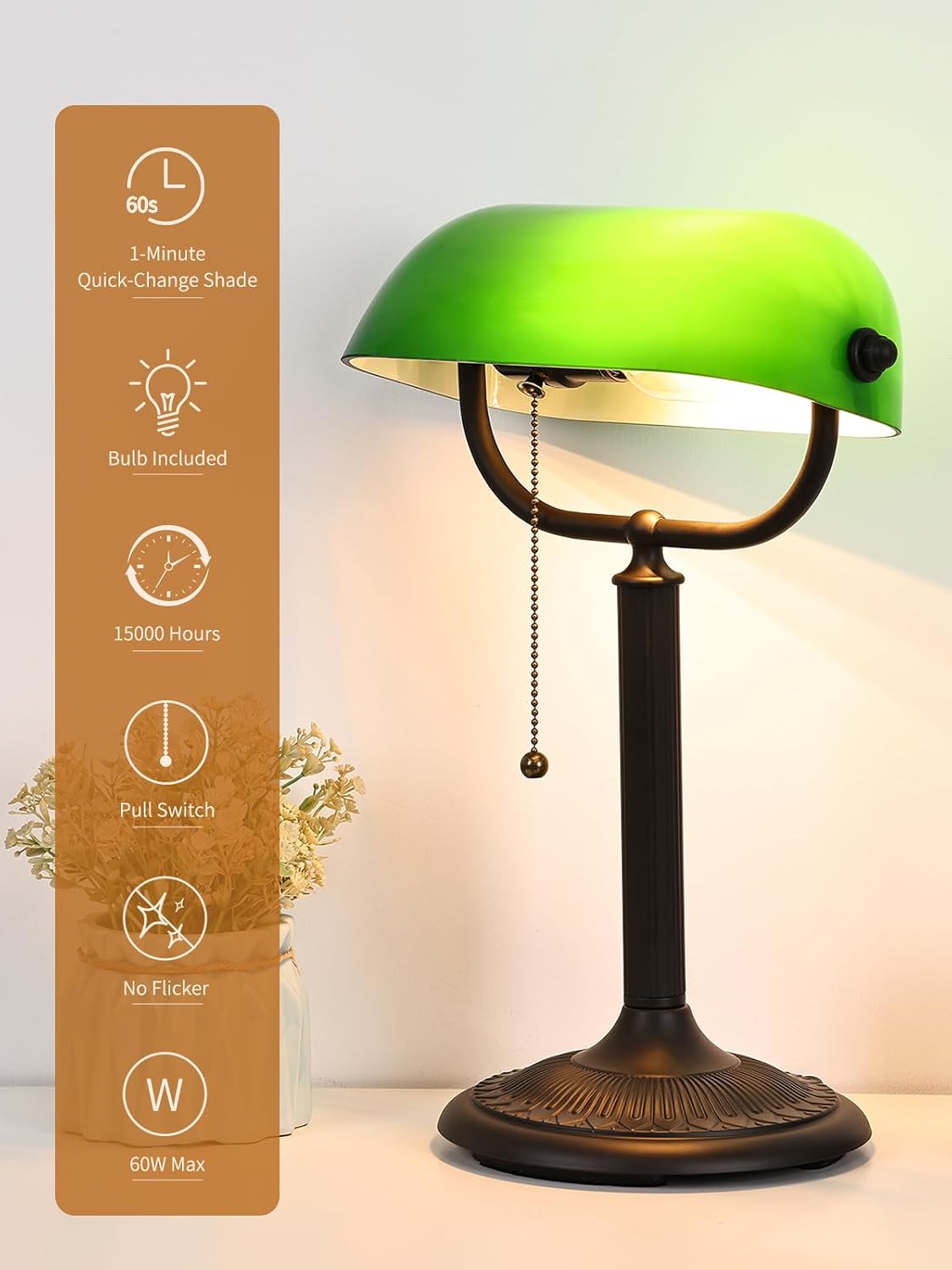 Antique green glass bankers desk lamp with a quick-change shade and pull switch features.