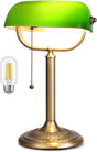 Classic green glass bankers desk lamp with a pull chain, featuring an elegant brass base and shade.