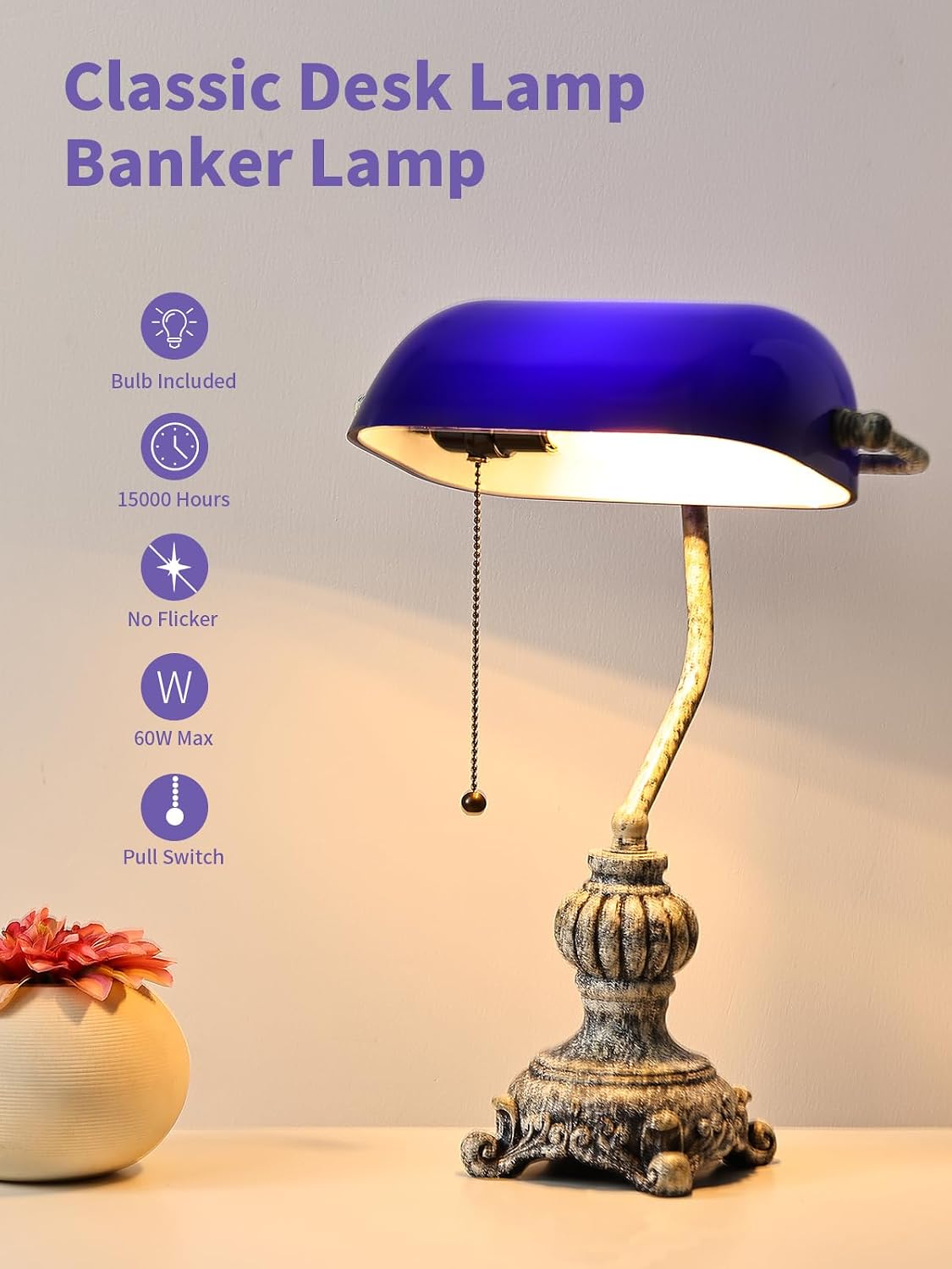 Retro blue glass desk lamp with a decorative base and pull switch, perfect for classic desk settings.
