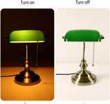 Green Glass Banker Desk Lamp with Pull Chain Switch displayed in on and off states.