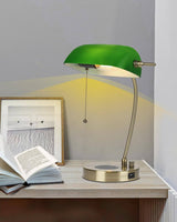 Newrays Green Glass Bankers Desk Lamp with Wireless Charger, USB Charging Port,Stepless Dimmable on a table with a book.