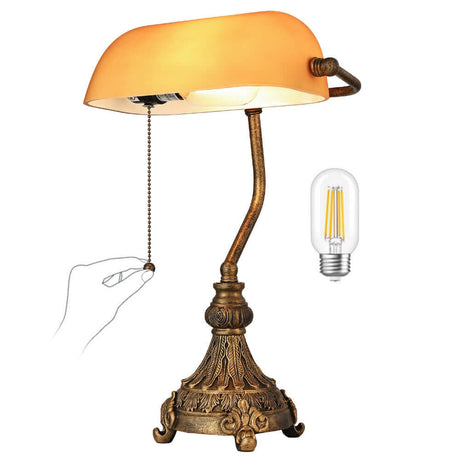 Vintage amber glass desk lamp with decorative base and LED bulb included.