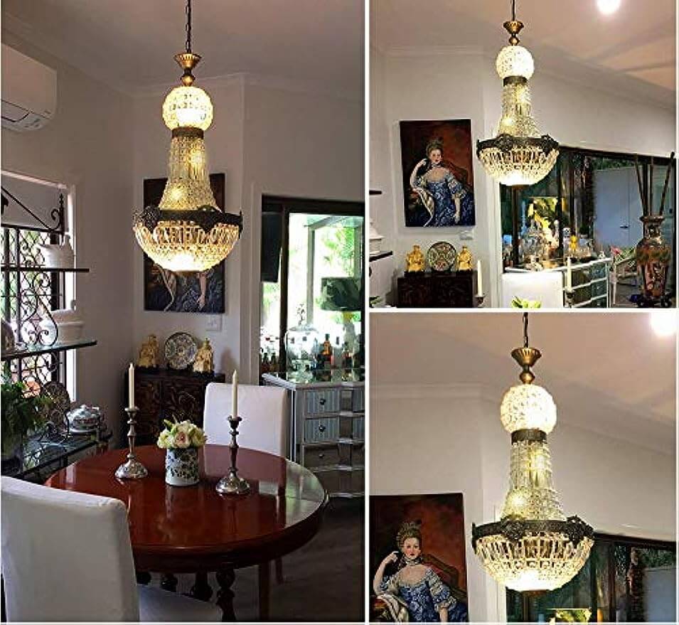Vintage Royal Empire Style Big Led Crystal Chandelier E14/E12 illuminating a dining area with artistic decor.