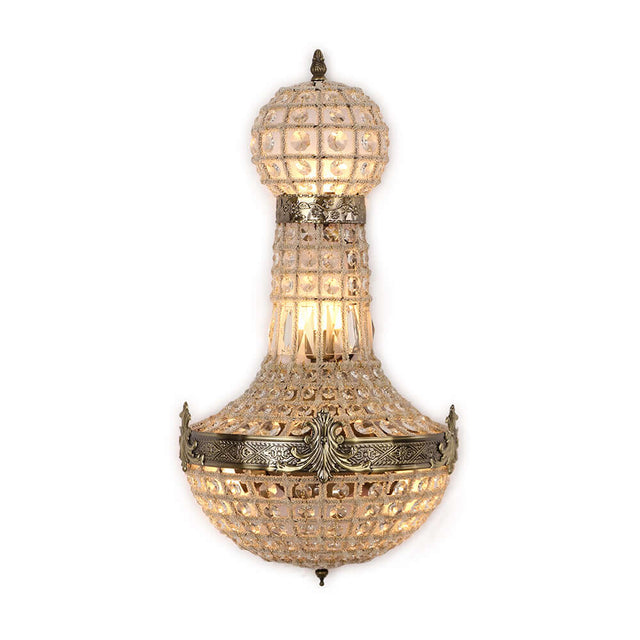 Vintage royal empire crystal wall sconces with intricate metalwork and elegant crystal design.