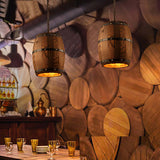 Wood Wine Barrel Pendant Lamp Unique Kitchen Bar Light H30 hanging in a rustic setting with wooden barrel wall decor.