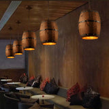 Wood Wine Barrel Pendant Lamp Unique Kitchen Bar Light H30 hanging in a stylish interior with plush seating.